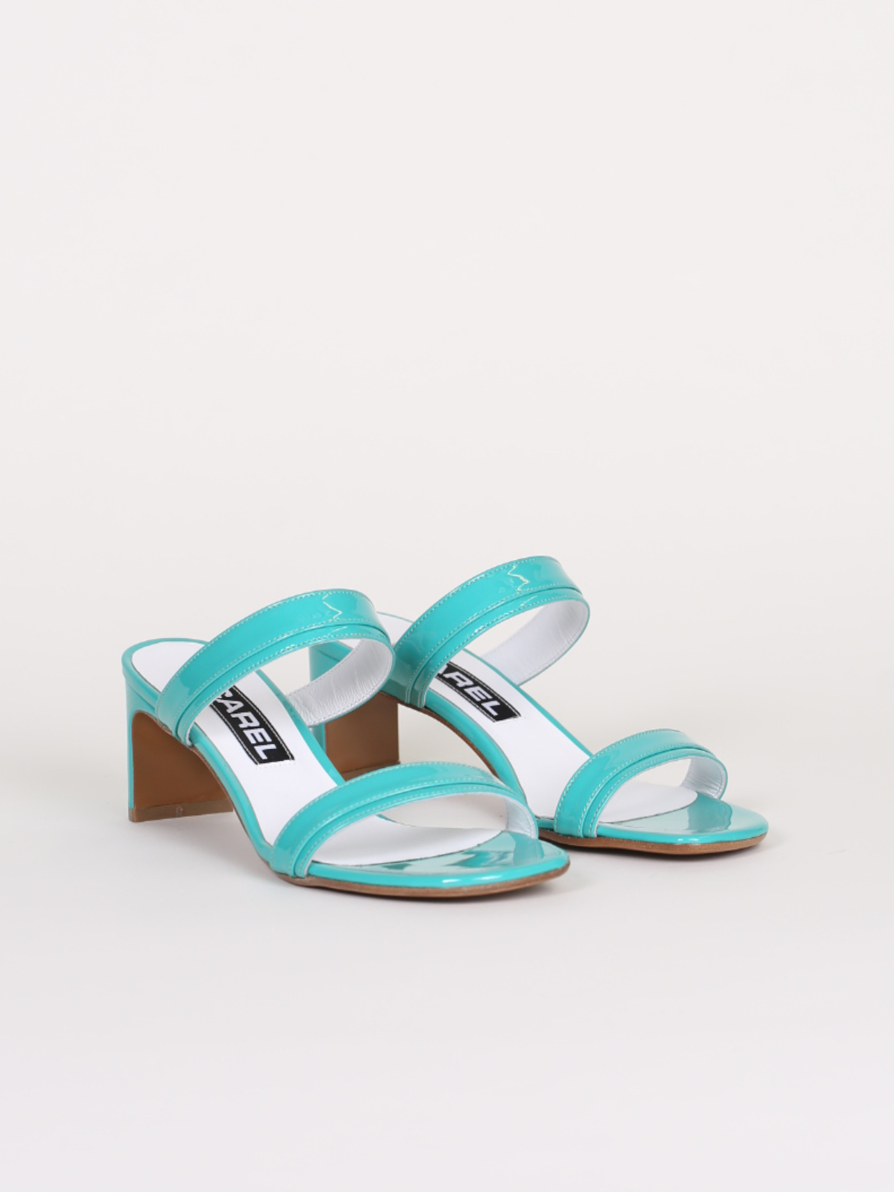 Turquoise patent leather mules